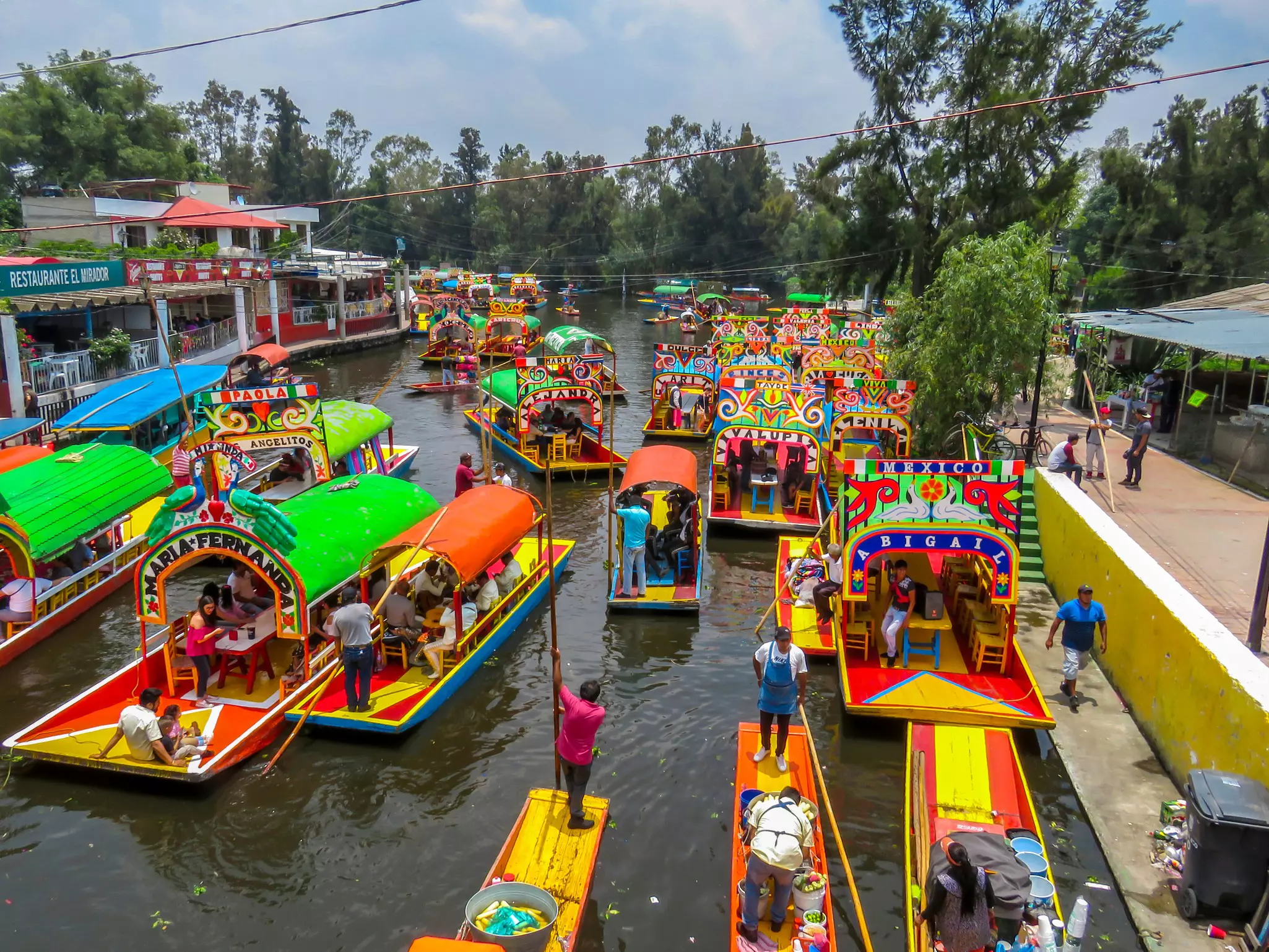 The whole family will enjoy riding a colorful gondola down the canals of Xochimilco © LIBIA SEGURA / Shutterstock
