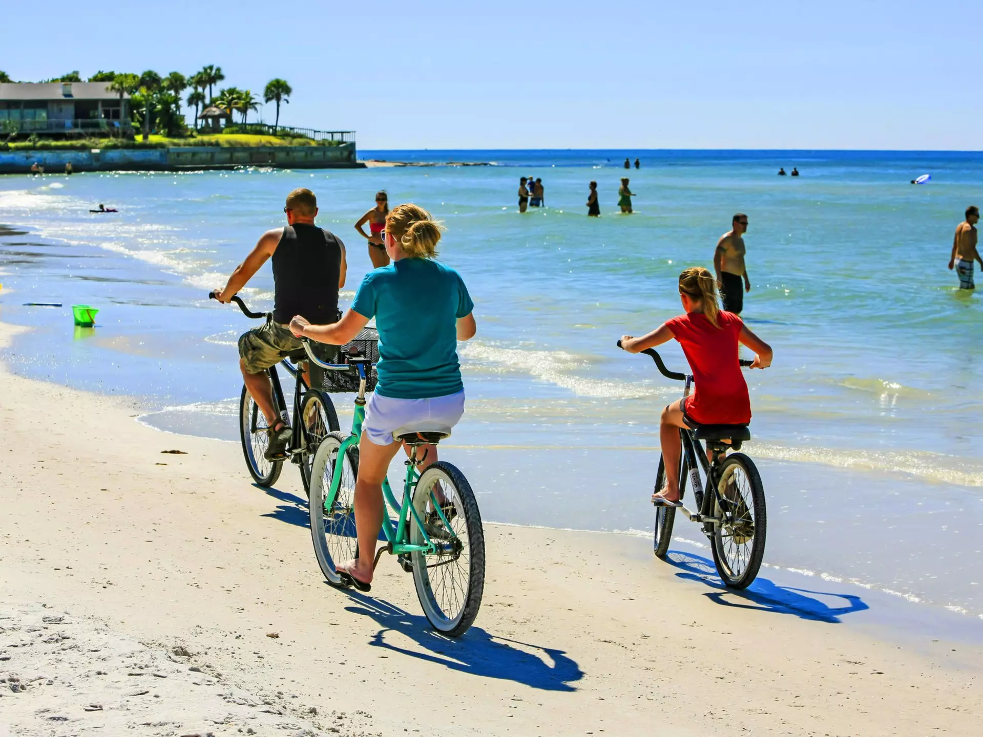 696719486
America; Attraction; Beach; Beach Cruisers; Bicycle; Bike; Child; Cycling; Exercise; Exercising; Family; Famous; Florida; Florida - US State; Full Length; Fun; Group; Group Of People; Gulf Coast States; Healthy Lifestyle; Heat - Temperature; Horizontal; Idyllic; Medium Group Of People; Non-Urban Scene; Outdoors; Paradise; Parent; Peddling; People; Photography; Place; Riding; Sarasota; Siesta Key; Sunlight; Tourism; Transportation; Travel; Travel Destinations; Two Wheels; USA; Vacation; Vacations;
Family group riding beach cruiser bicycles along Crescent beach on Siesta Key, Sarasota FL USA
