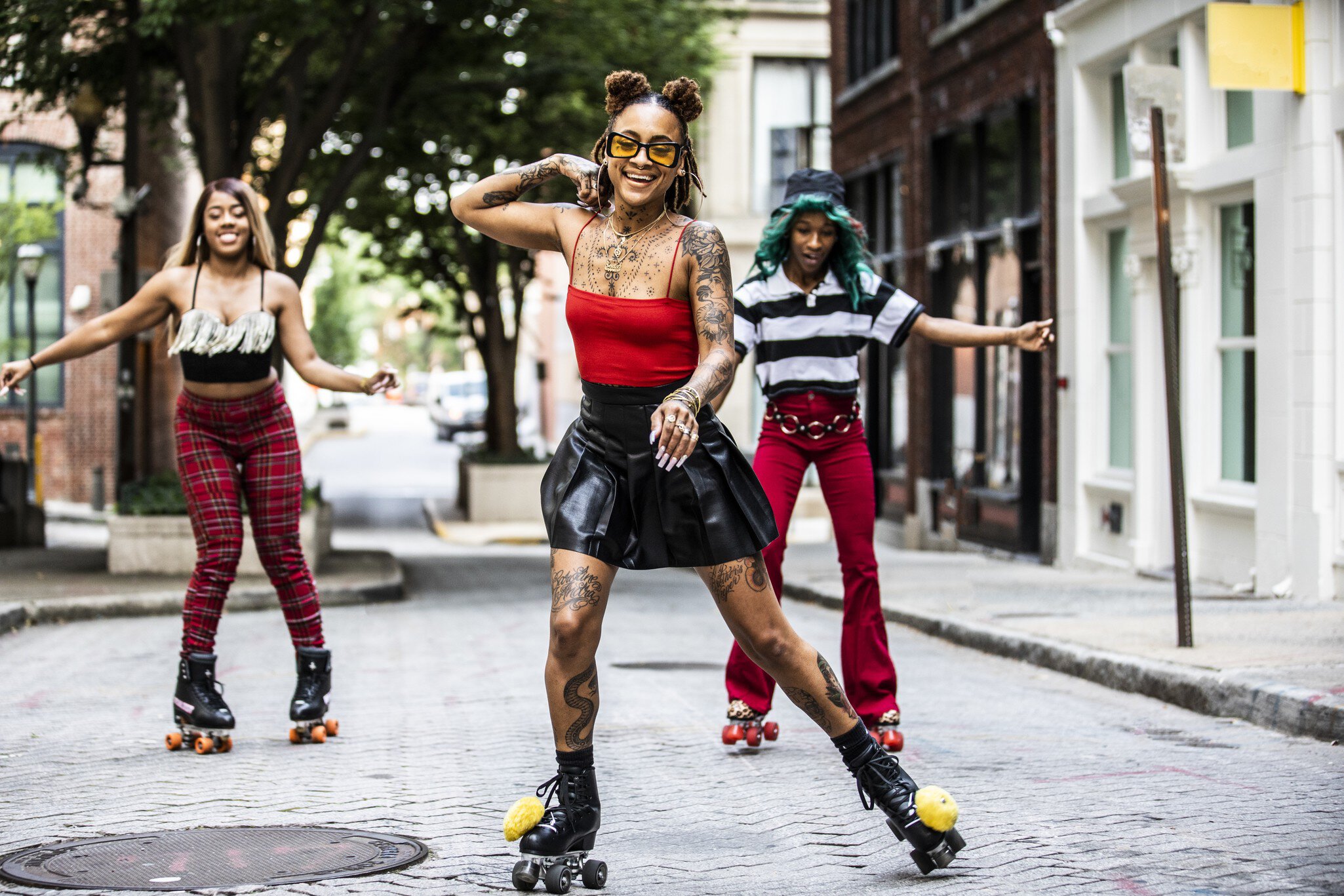 Young women rollerskating in urban area
