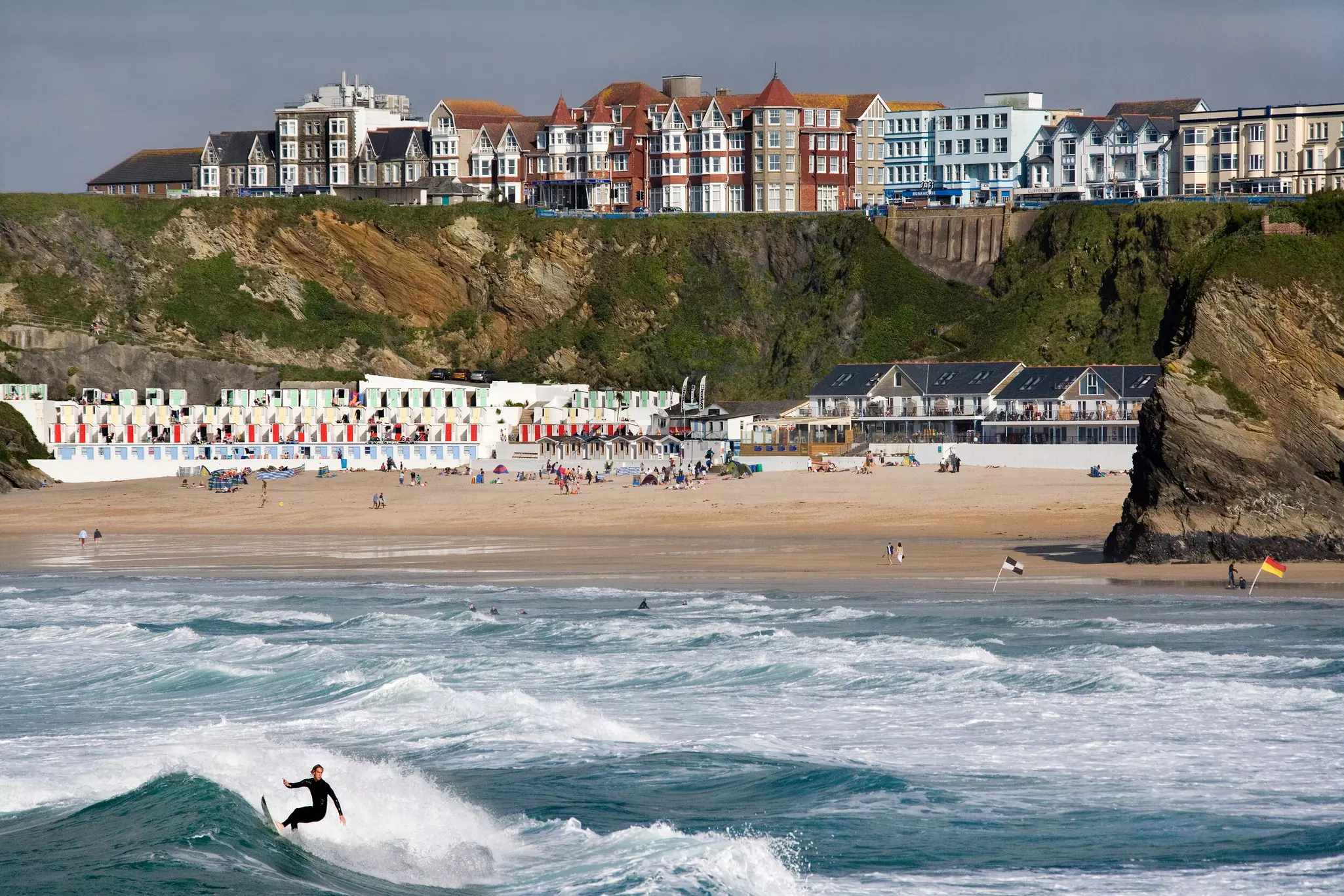Surfing off Great Western Beach in Newquay in Cornwall, England.