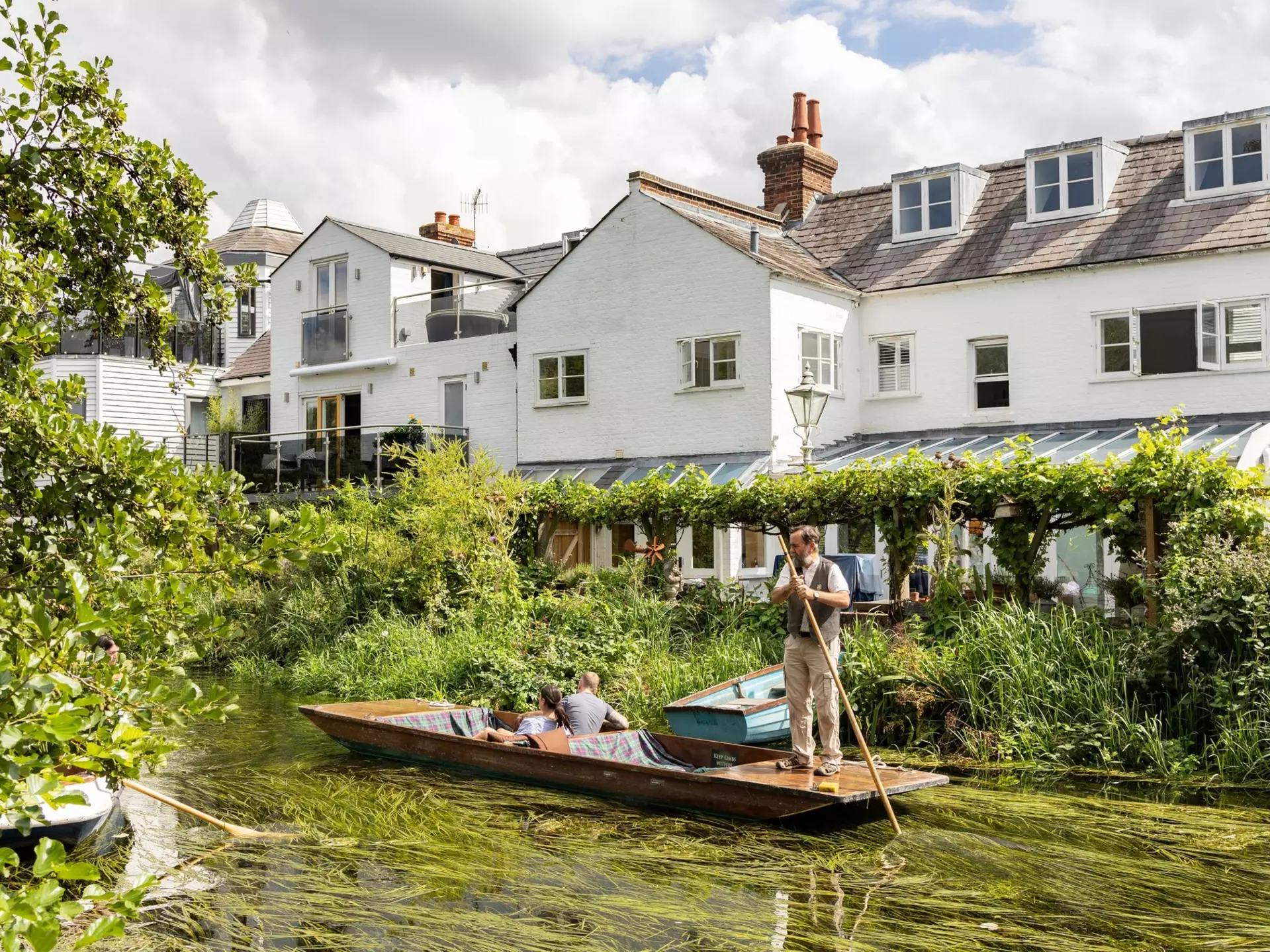 Medieval half-timber houses and Stour river in Canterbury Old Town, Kent, England