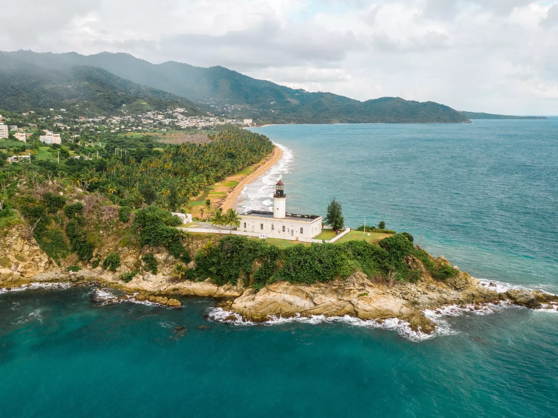 An aerial view of the Lighthouse in Maunabo, Puerto Rico  License Type: media  Download Time: 2023-08-18T03:25:57.000Z  User:   Is Editorial: No  purchase_order:   