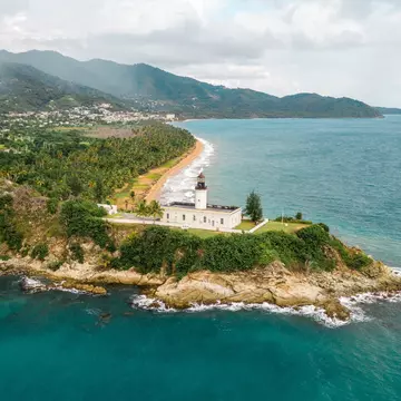 An aerial view of the Lighthouse in Maunabo, Puerto Rico  License Type: media  Download Time: 2023-08-18T03:25:57.000Z  User:   Is Editorial: No  purchase_order:   