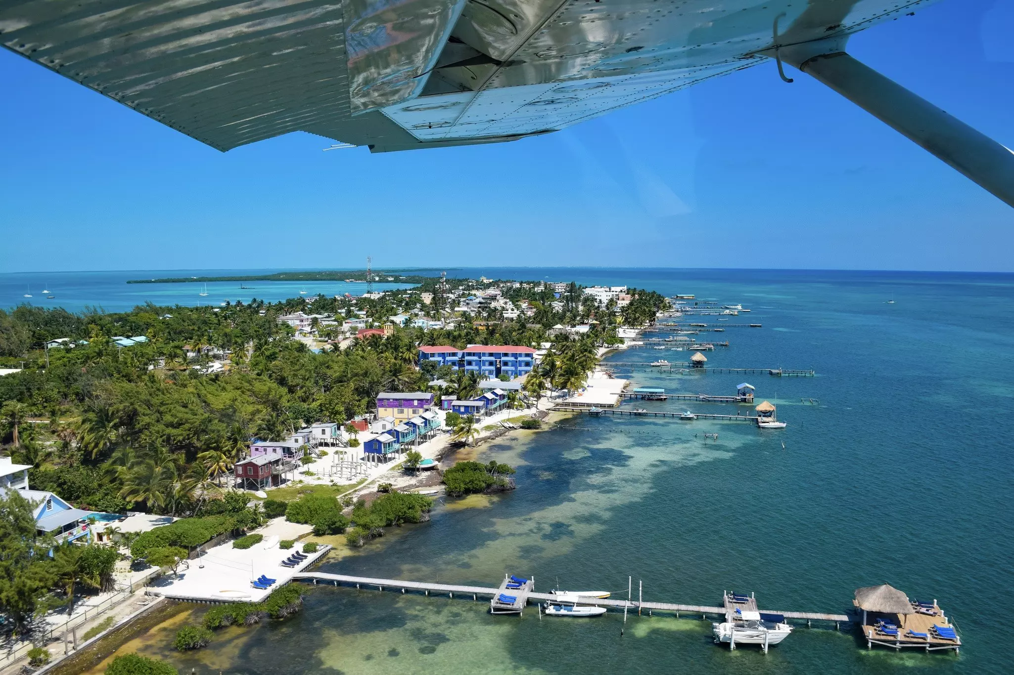 If you choose to take domestic flights you might get a view of Caye Caulker like this one © Emma Shaw / Lonely Planet
