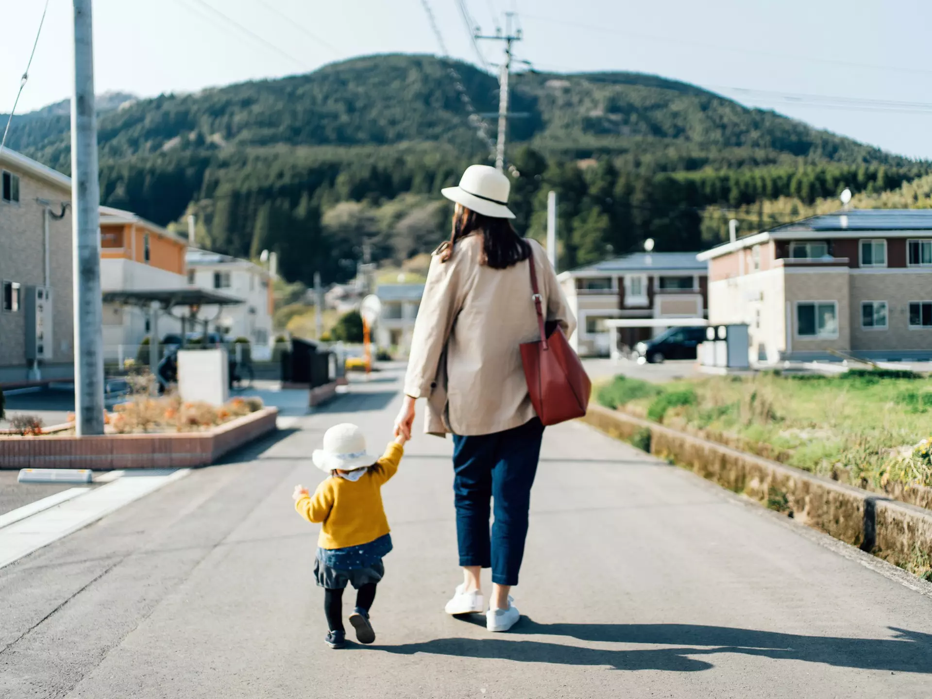 People travel alone with children all the time. d3sign / Getty Images