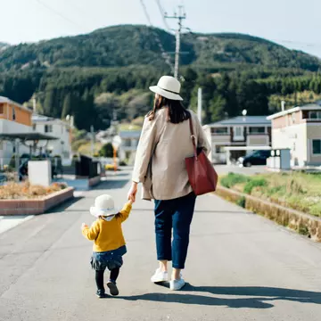 People travel alone with children all the time. d3sign / Getty Images