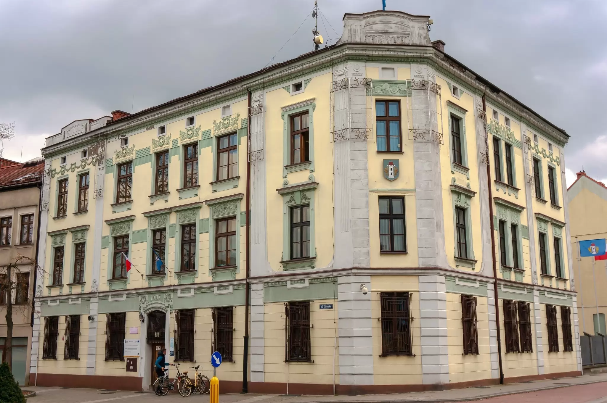 Bicycles parked outside the historic City Hall in Oświęcim, Poland.