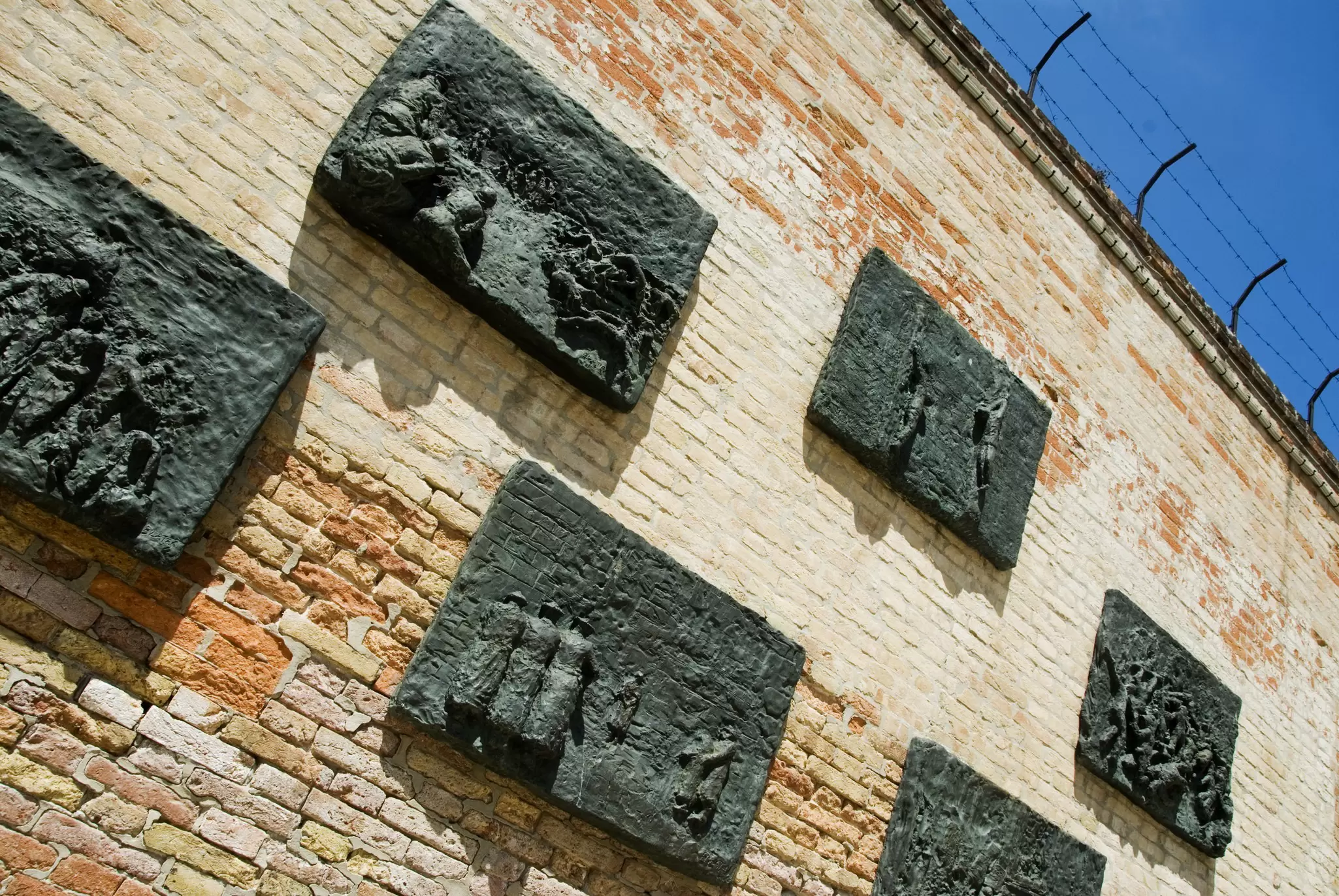 Holocaust memorial panels by Arbit Blatas in Campo de Ghetto Nuovo in the Jewish quarter of Venice, Italy.