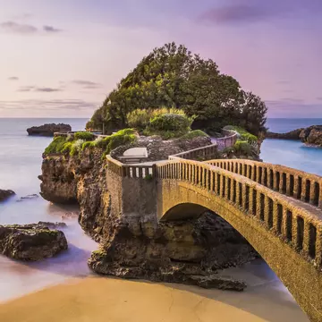 Bridge to the Rocher du Basta rock on the beach in Biarritz, France.