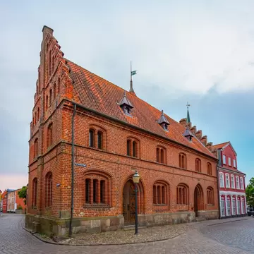 Facade of the old town hall in Danish town Ribe, Jutland, Denmark.