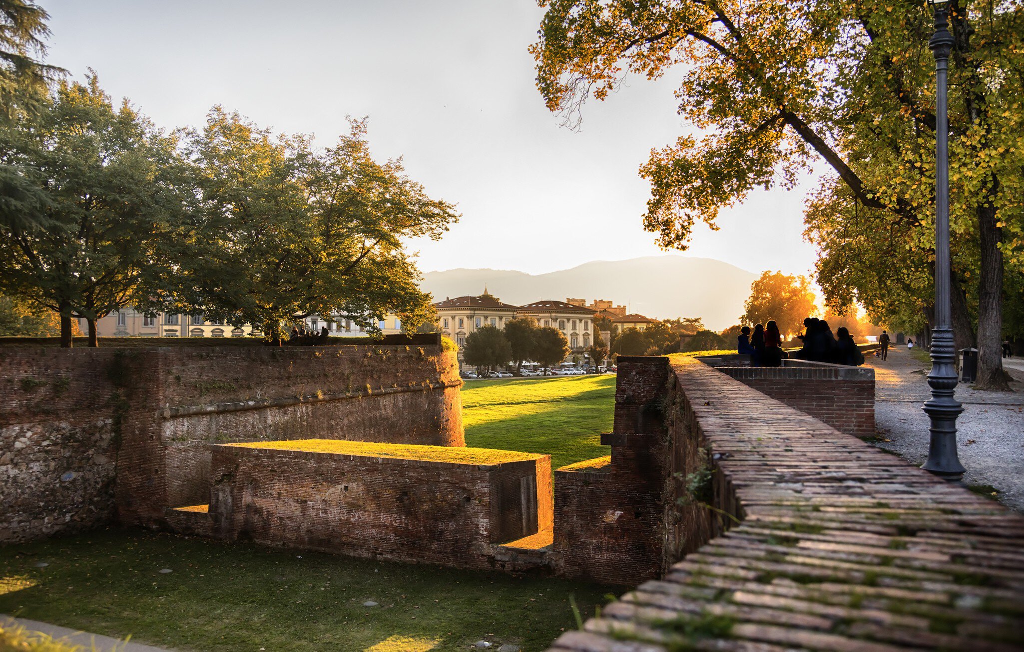 Sunset at the Medieval fortress wall in Lucca.