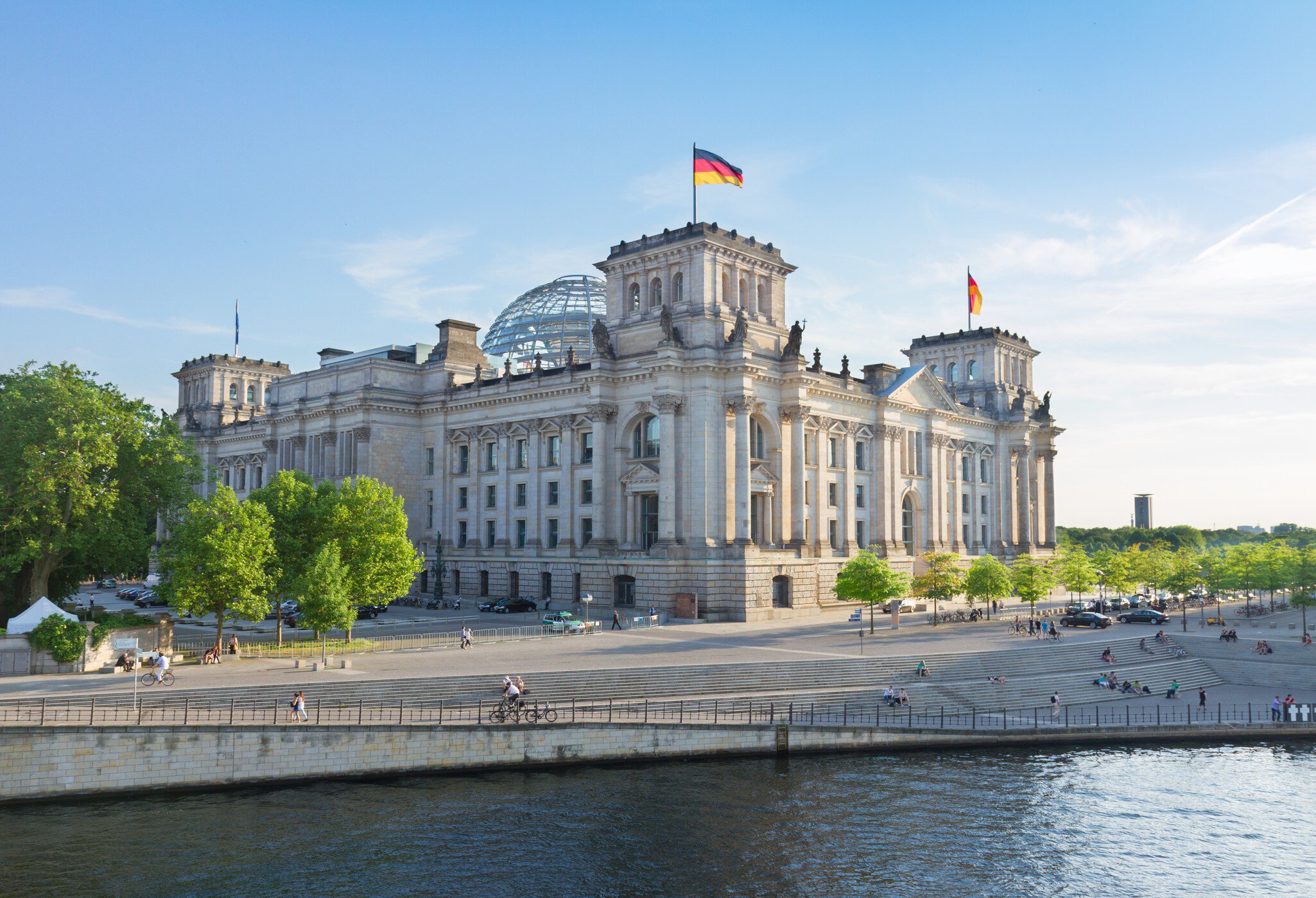 Reichstag building (german government) and river Spree in Berlin, Germany  License Type: media  Download Time: 2023-12-31T16:03:34.000Z  User: Norma.PrauseBrewer_LonelyPlanet  Is Editorial: No  purchase_order: 56530  