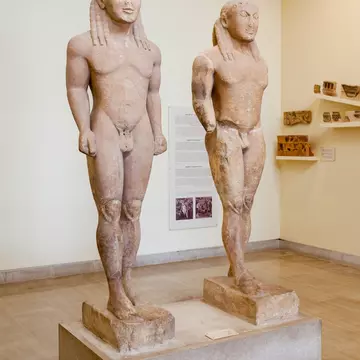 View of the twin statues by Polymedes at Delphi Archaeological Museum in Greece.