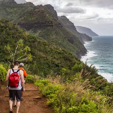 Hikers on the Kalalau Trail on the Na Pali Coast of Kauai © Alexander Howard/Lonely Planet