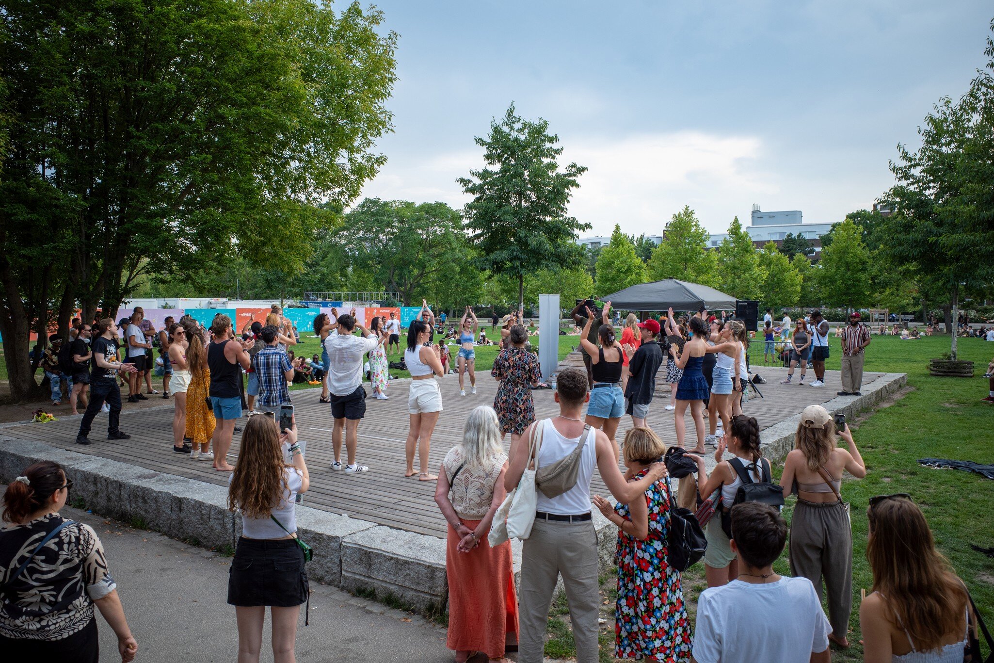 A crowd of people at Mauerpark in Berlin, Germany.