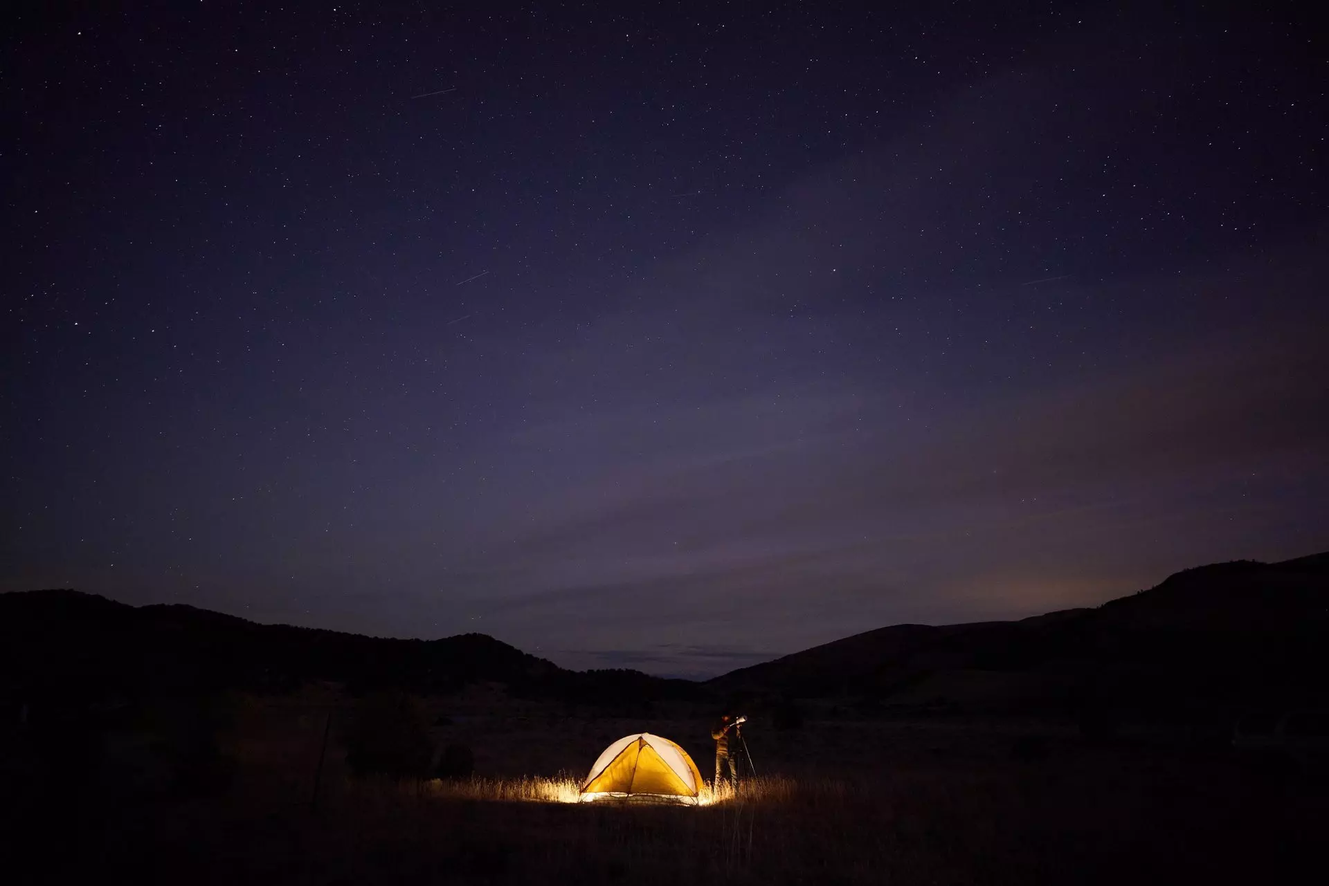 A tent under a starry sky at New Sky Ranch in Colorado, USA.