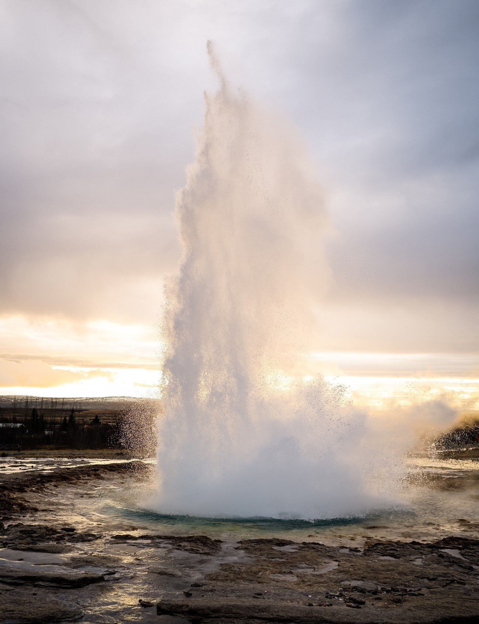 Eruption of the Strokkur geyser in Iceland during winter.