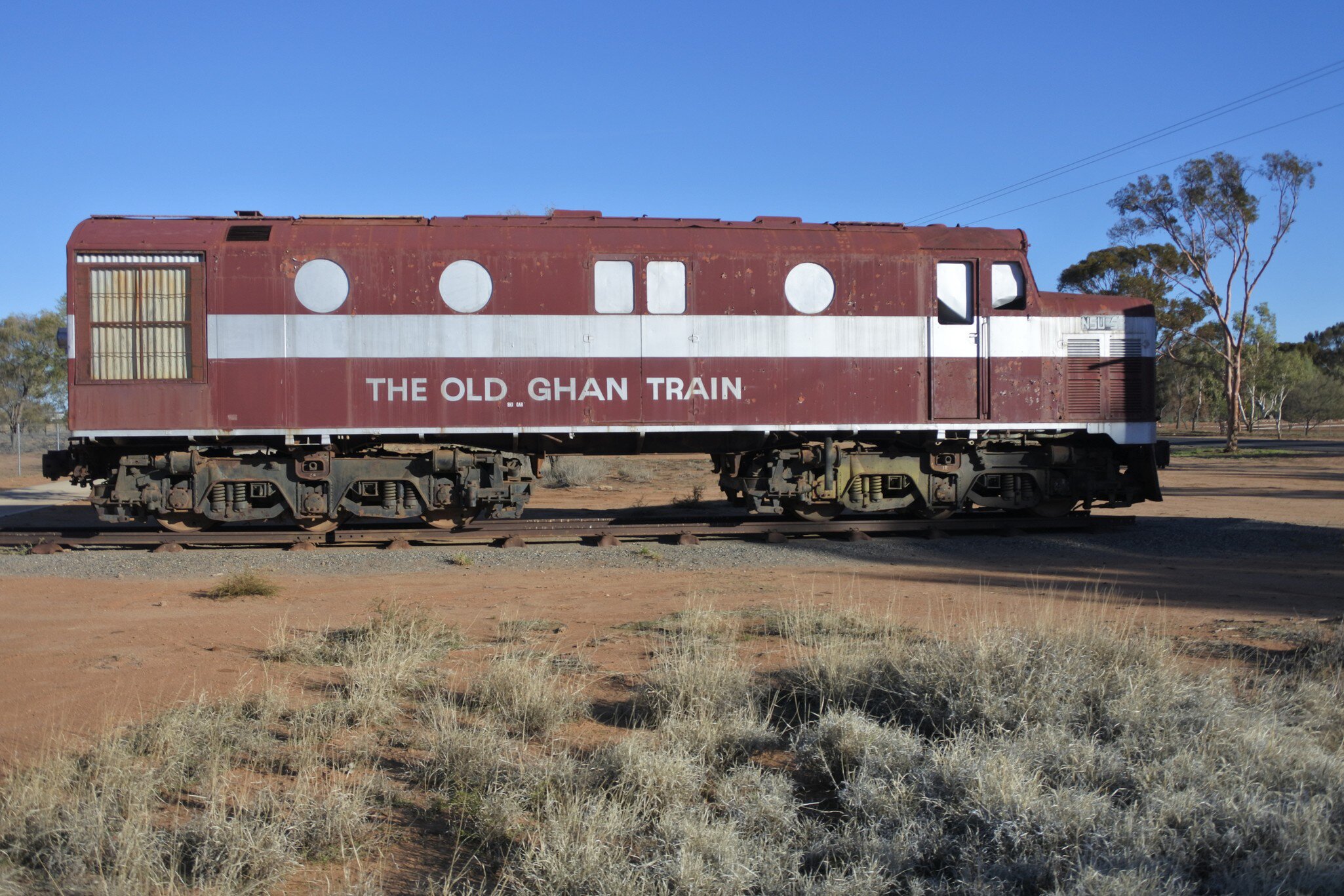 The Old Ghan Locomotive Train. The Ghan is an Australian passenger train service between Adelaide, Alice Springs and Darwin on the Adelaide - Darwin railway. 