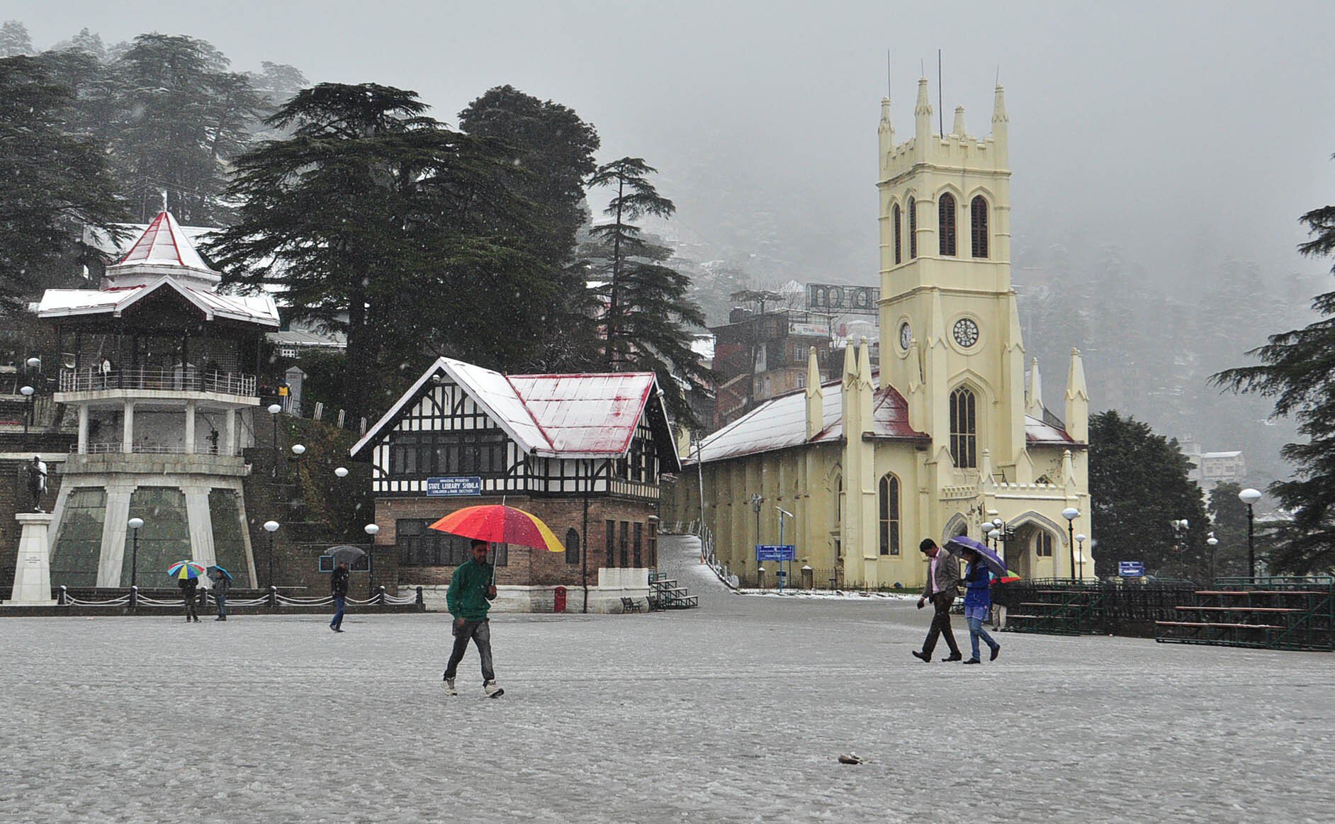 SHIMLA, INDIA - MARCH 2: People walking early morning after fresh spell of snowfall at Ridge on March 2, 2015 in Shimla, India. The picturesque tourist resorts of Shimla and Manali received more snow on Monday as the temperatures remained below the freezi
SHIMLA, INDIA - MARCH 2: People walking early morning after fresh spell of snowfall at Ridge on March 2, 2015 in Shimla, India. The picturesque tourist resorts of Shimla and Manali received more snow on Monday as the temperatures remained below the freezing point at most places in Himachal Pradesh. (Photo by Santosh Rawat/Hindustan Times via Getty Images)