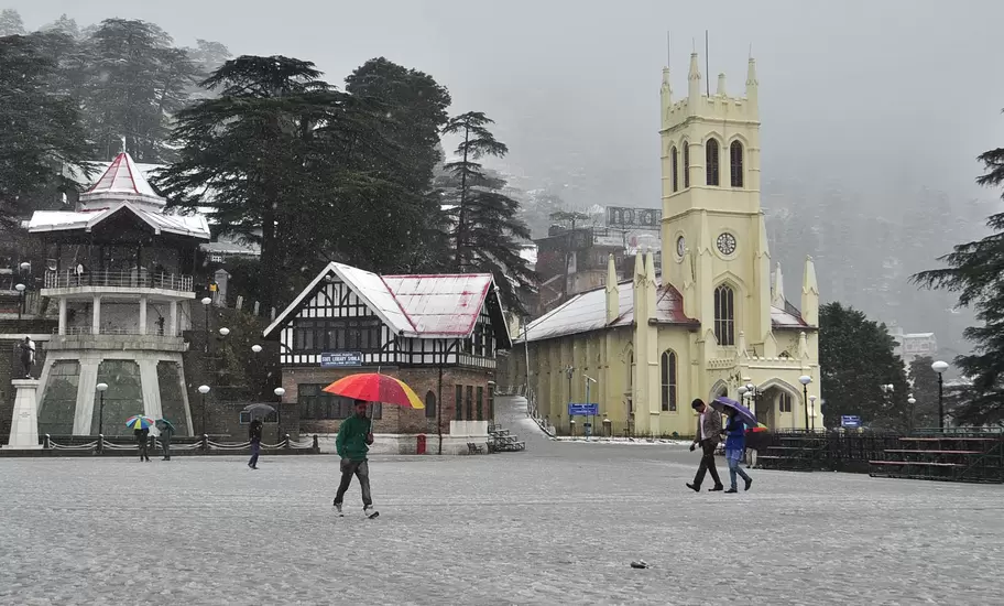 SHIMLA, INDIA - MARCH 2: People walking early morning after fresh spell of snowfall at Ridge on March 2, 2015 in Shimla, India. The picturesque tourist resorts of Shimla and Manali received more snow on Monday as the temperatures remained below the freezi
SHIMLA, INDIA - MARCH 2: People walking early morning after fresh spell of snowfall at Ridge on March 2, 2015 in Shimla, India. The picturesque tourist resorts of Shimla and Manali received more snow on Monday as the temperatures remained below the freezing point at most places in Himachal Pradesh. (Photo by Santosh Rawat/Hindustan Times via Getty Images)