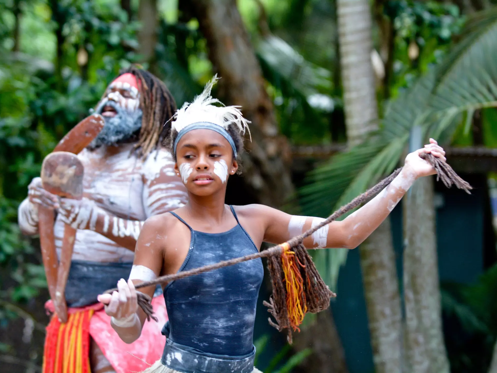Young adult Indigenous Australian woman dancing in Queensland