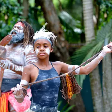 Young adult Indigenous Australian woman dancing in Queensland
