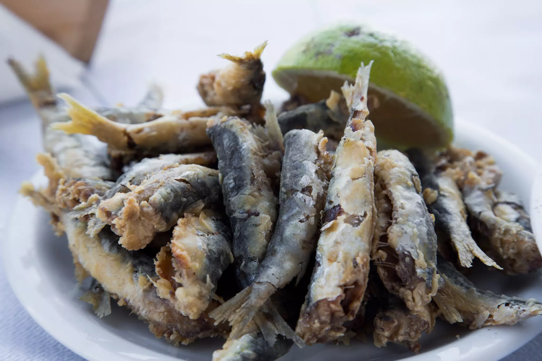 Small fish varieties, particularly Kalloni sardines, are exclusive to the area and are highly appreciated © Holger Leue / Getty Images