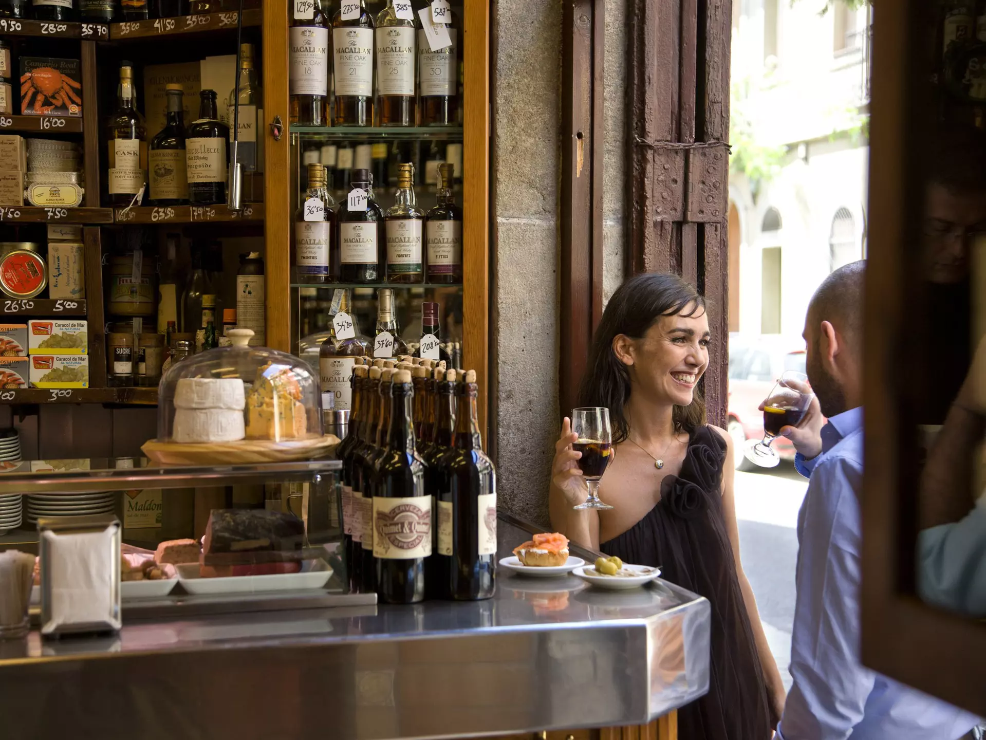 Couple sharing a drink and tapas at Quimet i Quimet, Barri Gotic.
Lonely Planet Traveller Magazine, Issue 40, Catalonia, Perfect trip