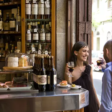 Couple sharing a drink and tapas at Quimet i Quimet, Barri Gotic.
Lonely Planet Traveller Magazine, Issue 40, Catalonia, Perfect trip