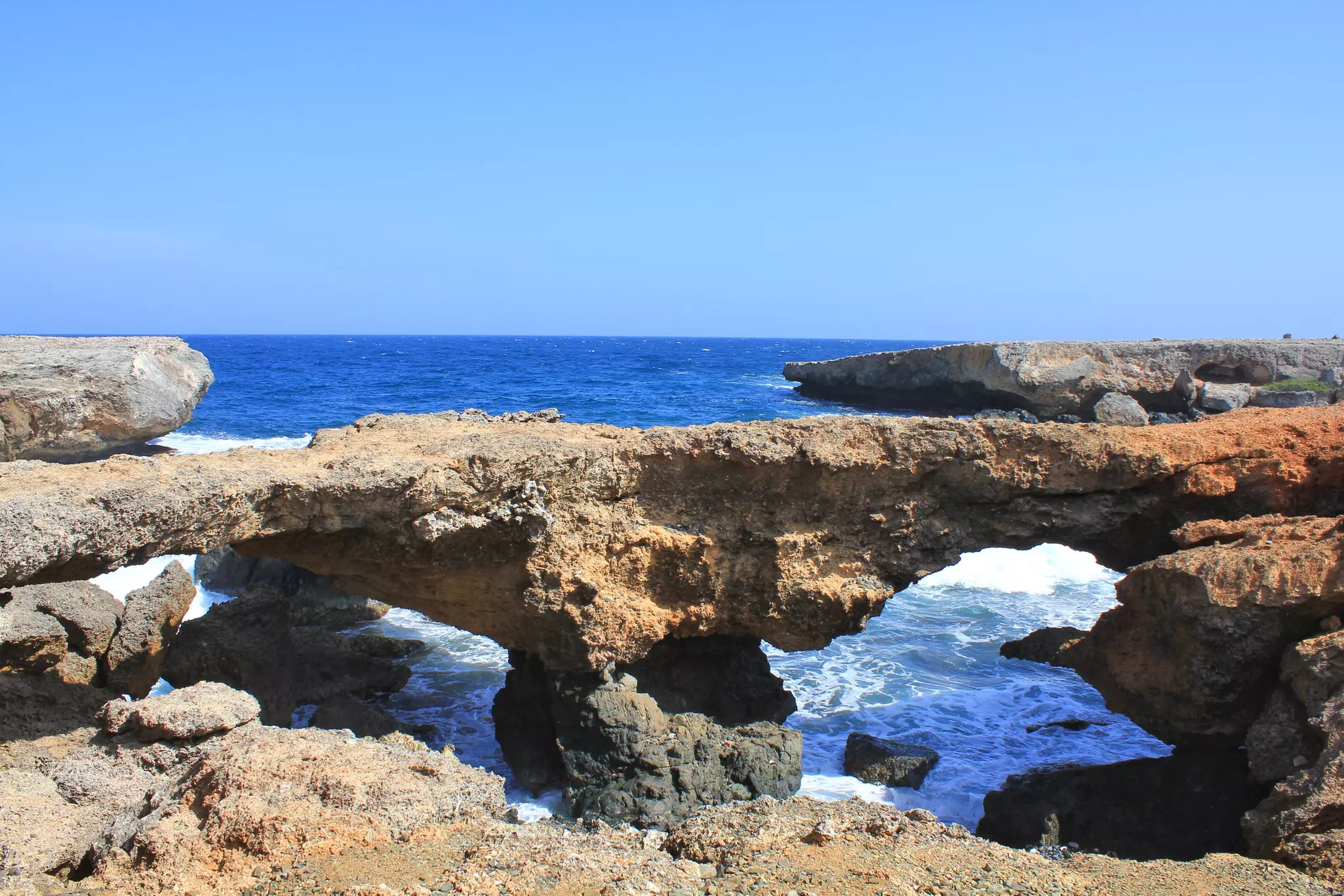 Rock windows formation, with the sea passing beneath a limestone bridge