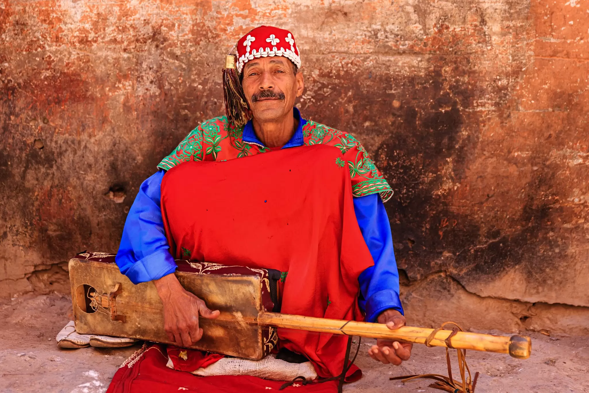 Moroccan street musician on Djemaa el Fna square. Bartosz Hadyniak/Getty Images