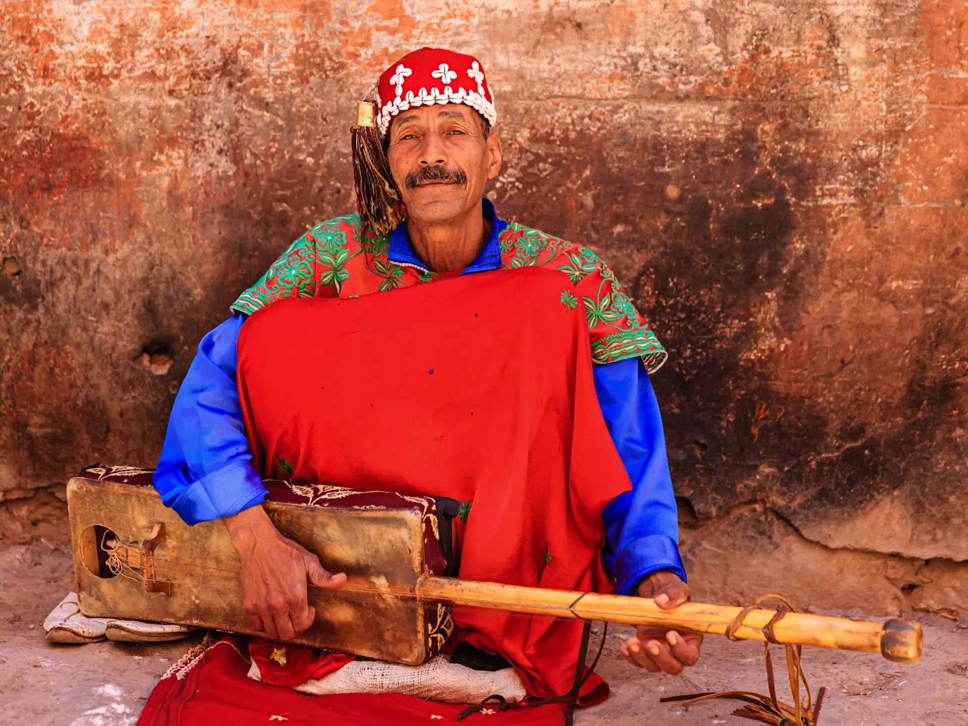 Moroccan street musician on Djemaa el Fna square. Bartosz Hadyniak/Getty Images