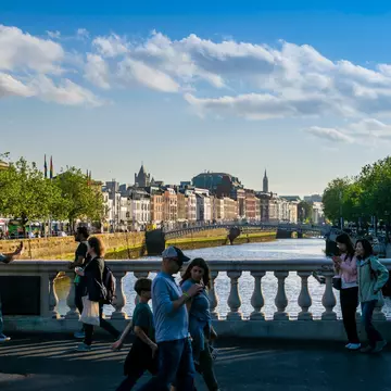 Tourists on O'Connell Bridge, Dublin. Kris Dublin/Shutterstock