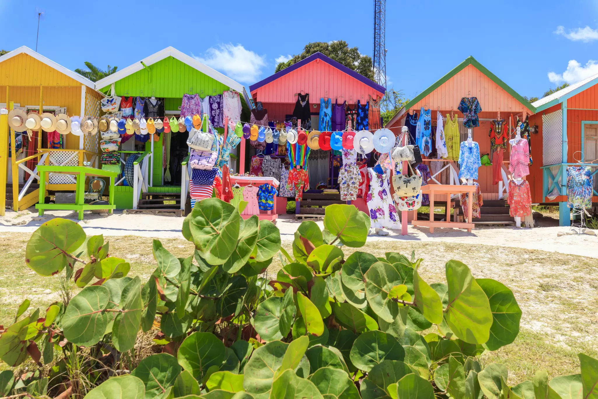 Pick up some new beach accessories at the colorful kiosks along Long Bay Beach  © Getty Images