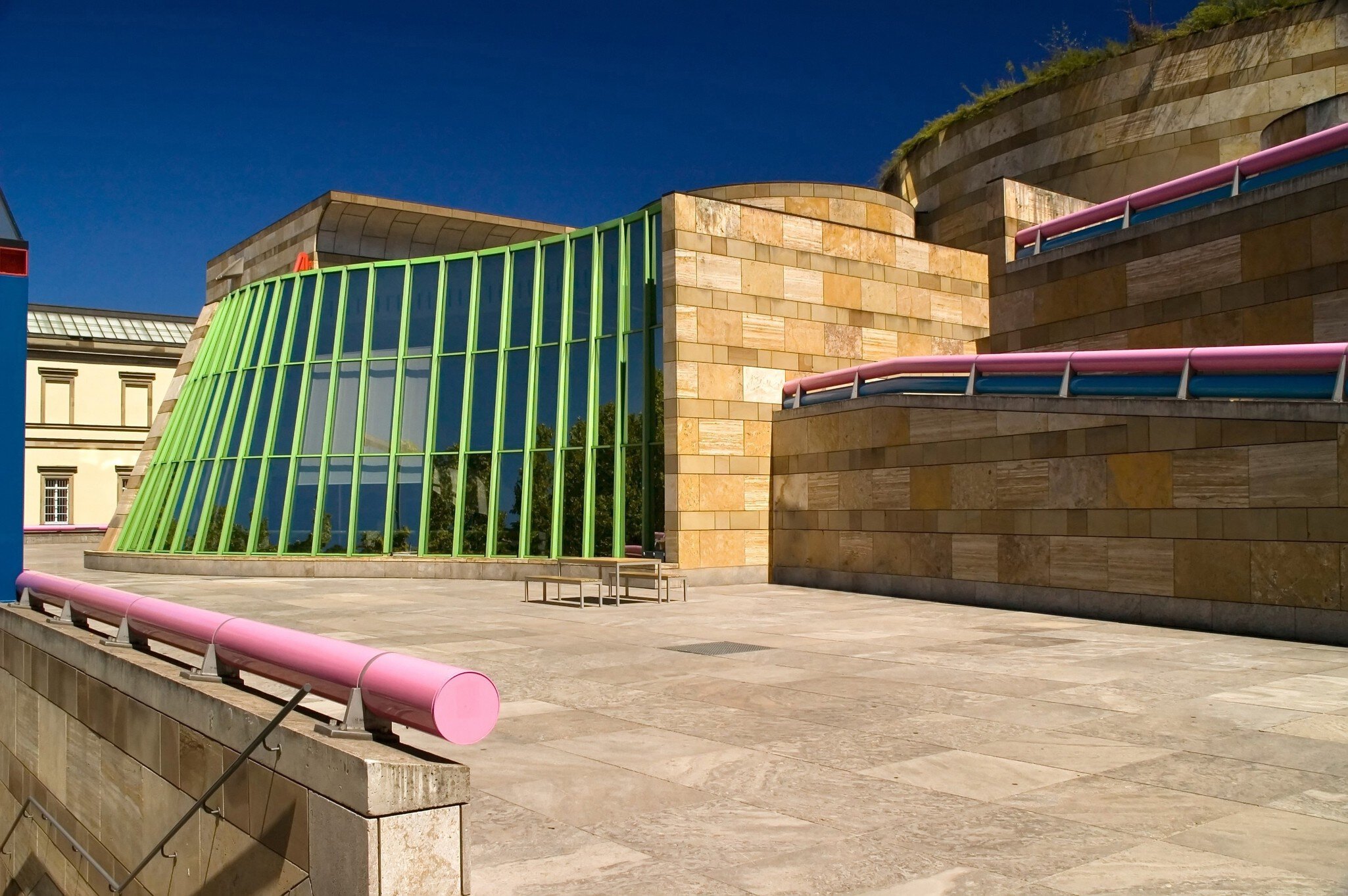 Green and pink exterior of Staatsgalerie Stuttgart in Stuttgart, Baden-Württemberg, Germany.
