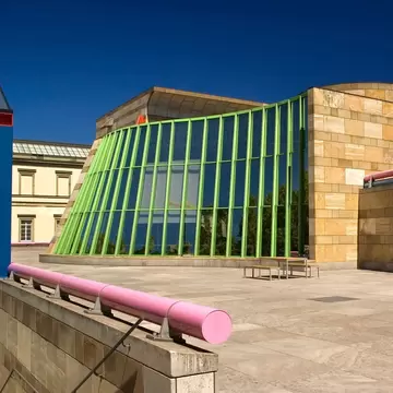 Green and pink exterior of Staatsgalerie Stuttgart in Stuttgart, Baden-Württemberg, Germany.