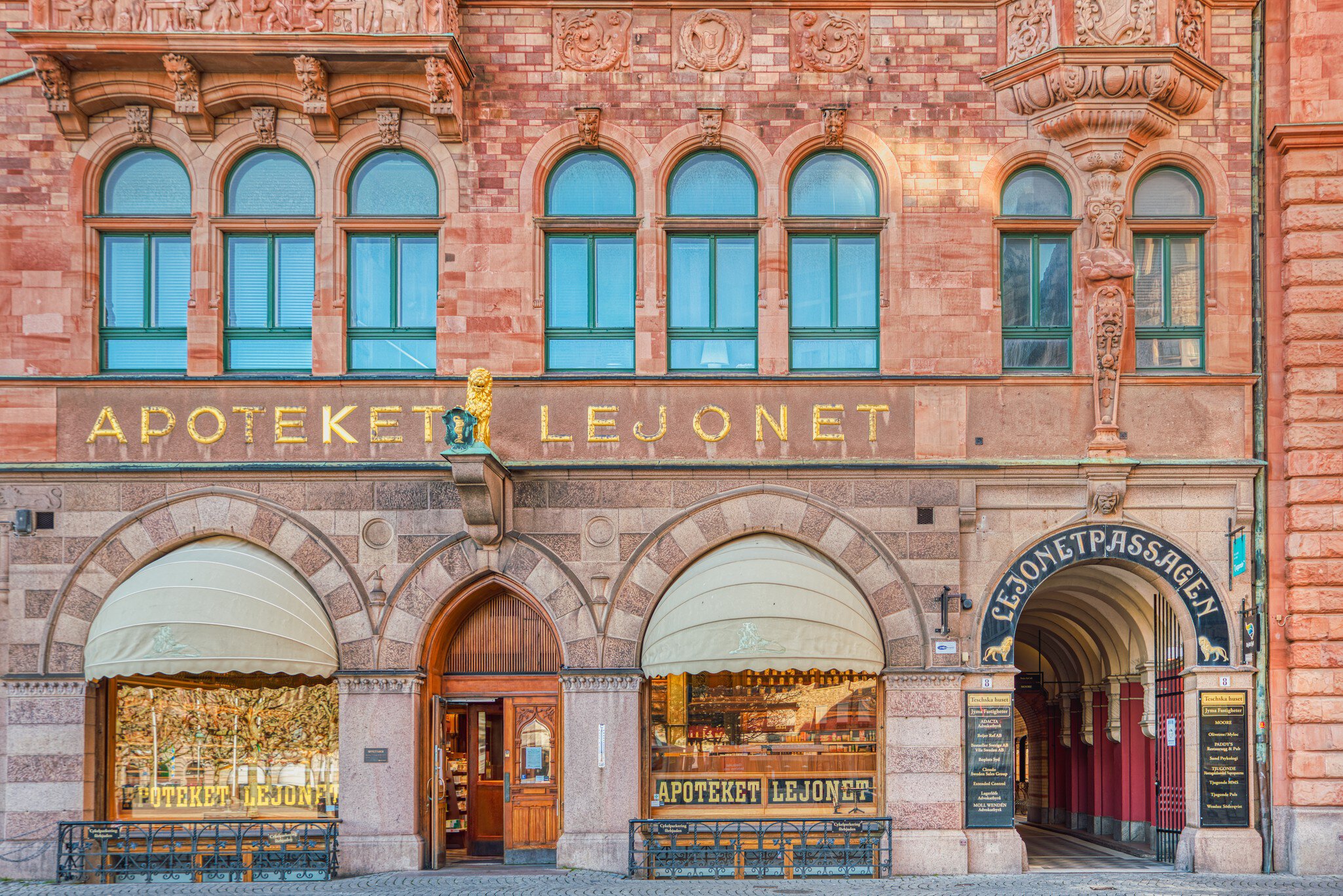 Malmo, Sweden - April 11, 2020  Historical Apoteket Lejonet (Lejonet Pharmacy) facade with the Pasaje Lejonet or passage El Leon, in front of the Stortorget square. Old facade with apothecary entrance  License Type: media  Download Time: 2023-06-25T09:06:09.000Z  User: hannahblackie10  Is Editorial: Yes  purchase_order: 56530/Global Publishing WIP  