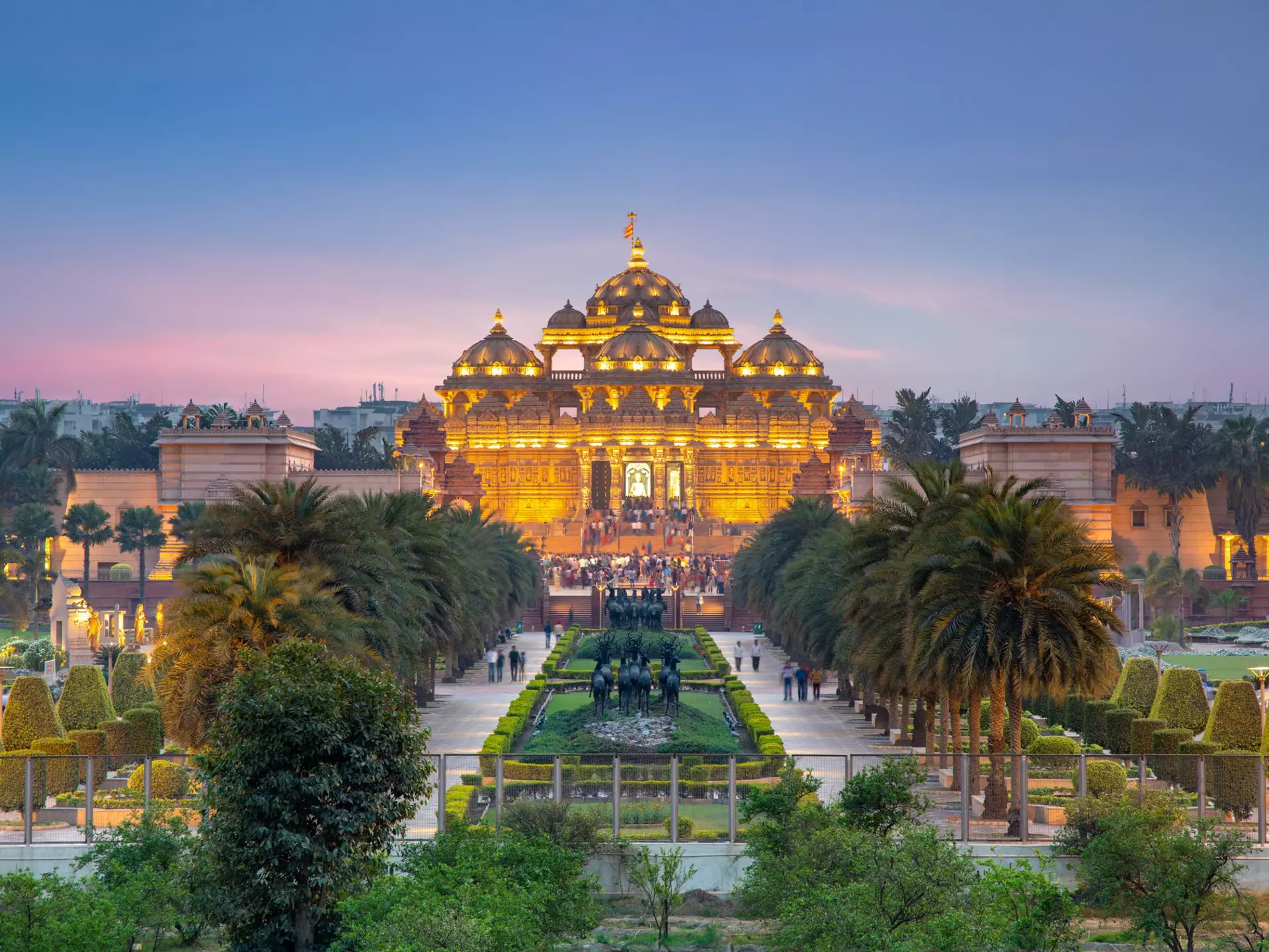 The Akshardham Temple in Delhi, illuminated at sunset. Sean Hsu/Shutterstock