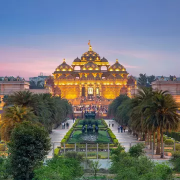 The Akshardham Temple in Delhi, illuminated at sunset. Sean Hsu/Shutterstock
