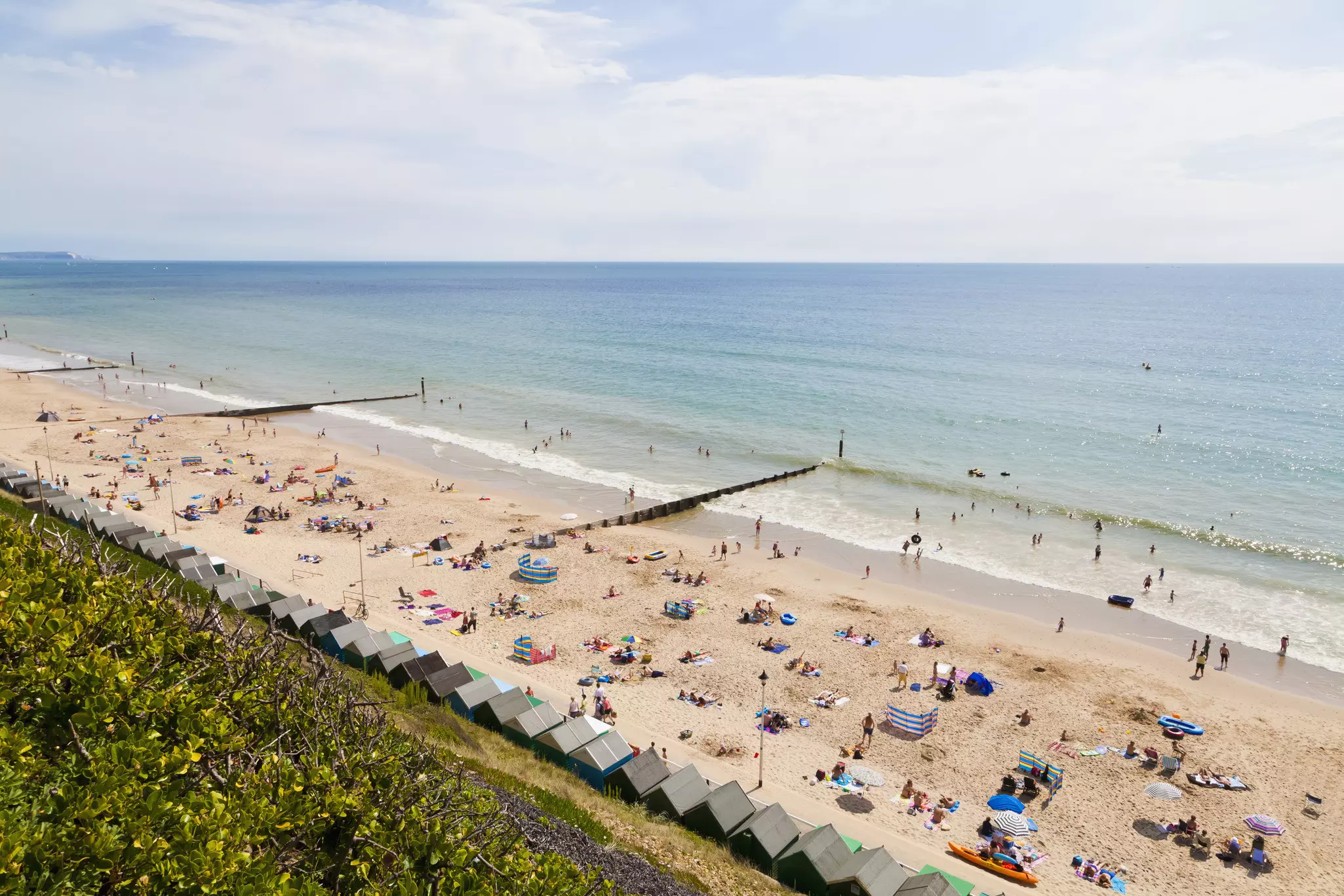 A high-angle view of beachgoers on a sunny day
