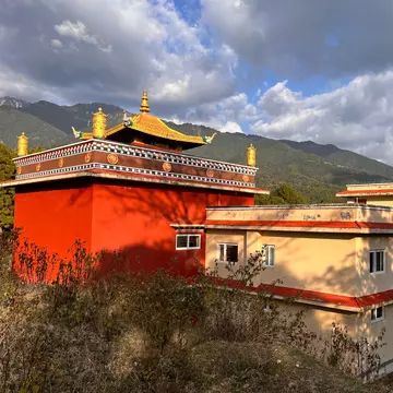 Palpung Sherabling Monastery, situated in the foothills of Kangra Valley, beautiful coverage of mountains and surrounded with the shadow of pine trees. Himachal Pradesh, India.