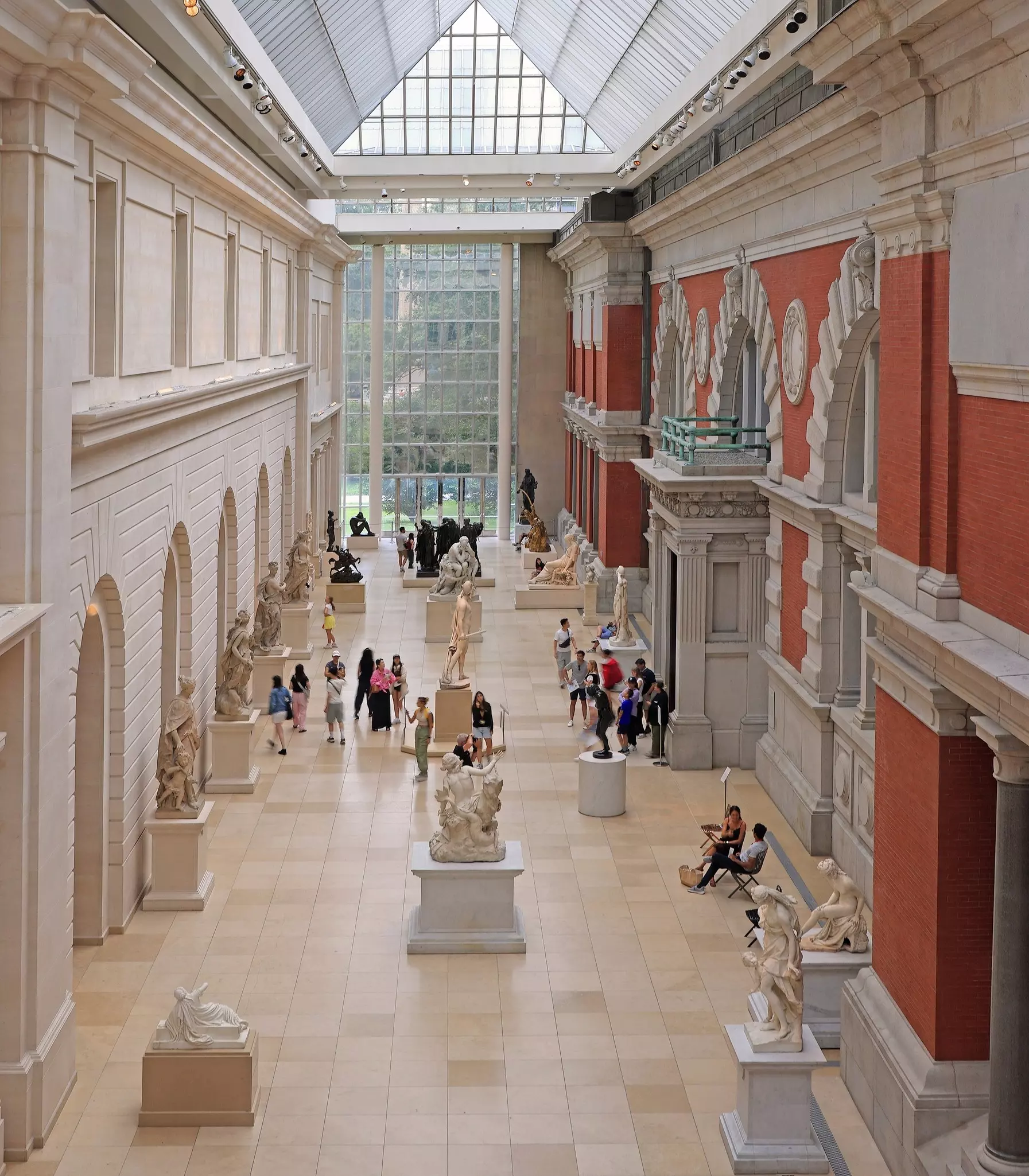New York City, USA – August 11, 2024: Tourists enjoying visiting Metropolitan Museum in Carroll and Milton Petrie European hall sculptures., License Type: media, Download Time: 2026-06-09T19:58:51.000Z, User: adouglaslott59, Editorial: true, purchase_order: 65050 - Digital Destinations and Articles, job: online editorial, client: Books in our travel bags this summer and where they're set, other: Ann Douglas Lott