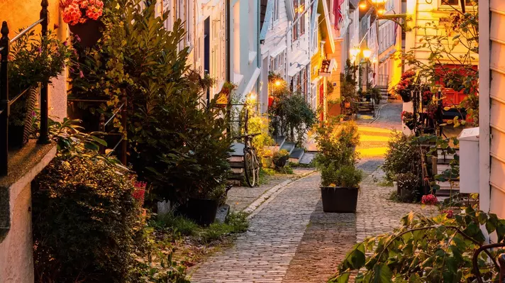 Bergen, Norway, Romantic evening scene of a narrow cobblestone street