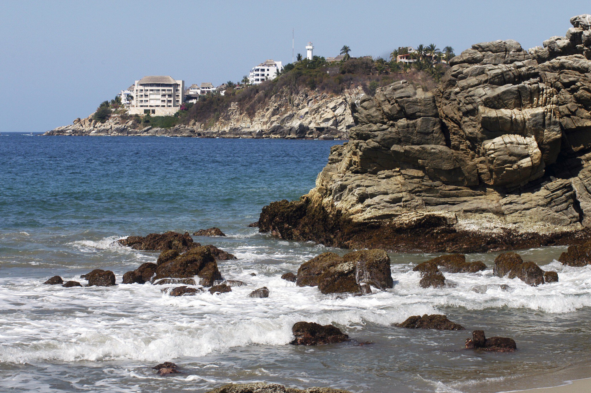 Bay in Puerto Escondido with hotel and lighthouse, Mexico
Beach in Puerto Escondido, Mexico
azure,bay,beach,blue,breaking,cliffs,cloudy,coast,colour,holiday,island,landscape,mountains,nature,ocean,outdoors,peacefull,relaxing,rocks,sand,sea,serene,sky,stunning,summer,sunbathing,sunny,tide,tranquil,travel,vacation,walking,water,wawes,lighthouse,building,puerto escondido,mexico,south america
CLEARED FOR DIGITAL USE ONLY -