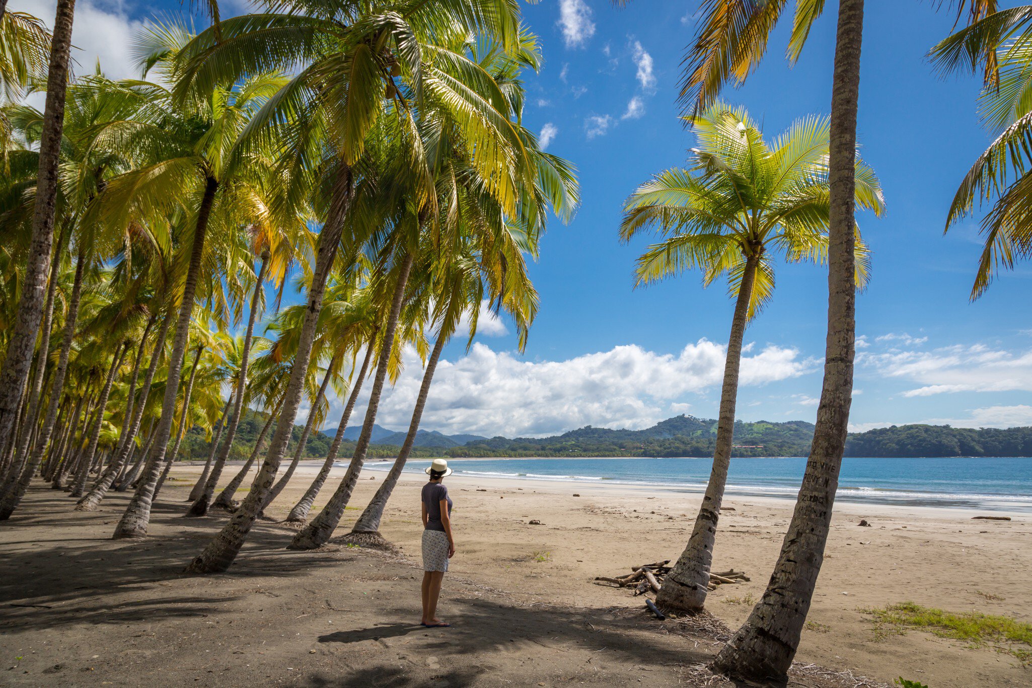 Beautiful blue sky day with a blue sea and empty sand. Playa Samara, Costa Rica, Central America.