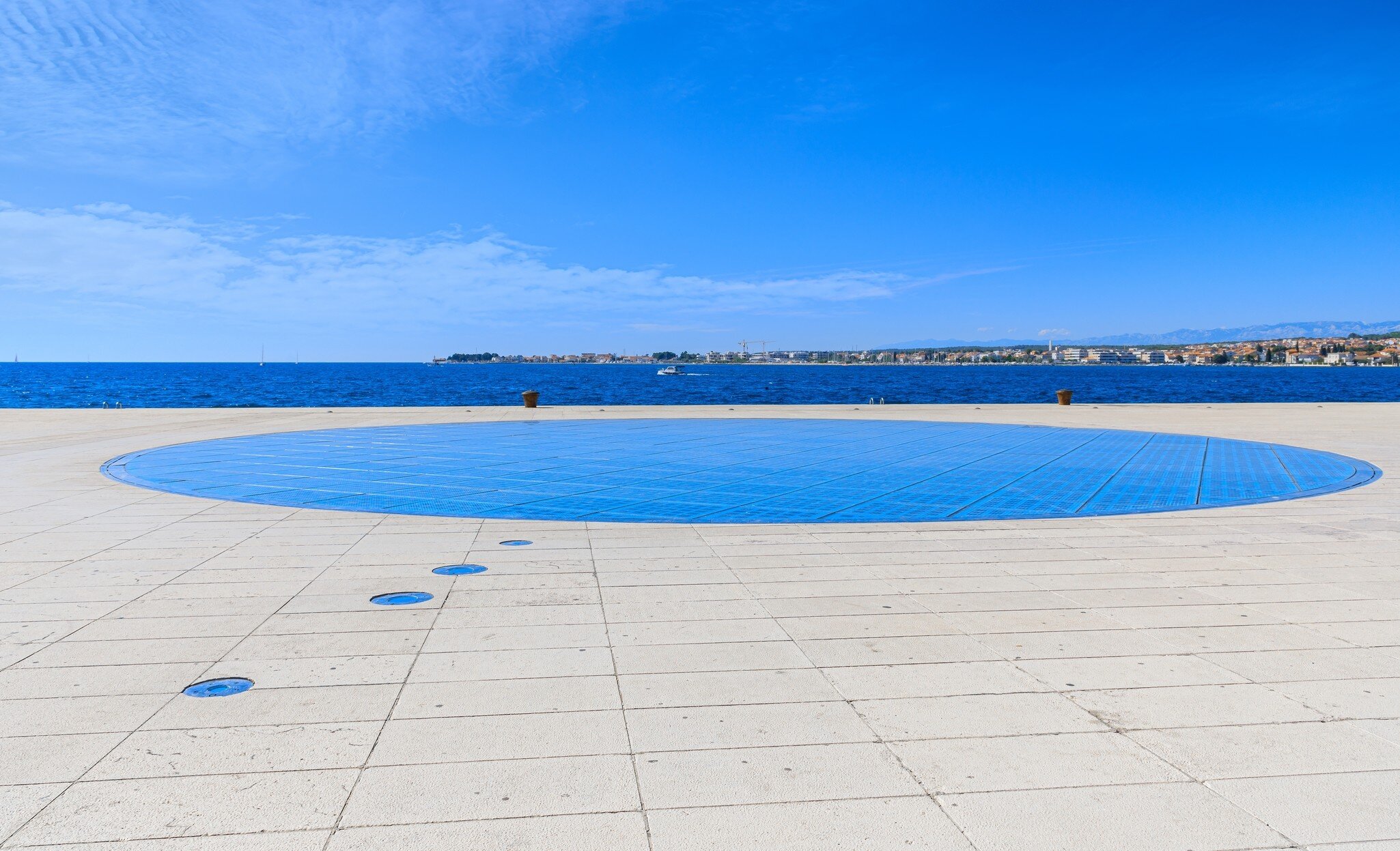 Zadar cityscape, Croatia: view of Monument to the Sun or The Greeting to the Sun., License Type: media, Download Time: 2026-02-23T00:47:05.000Z, User: LP_YKhanna, Editorial: false, purchase_order: 65050 - Digital Destinations and Articles, job: LP, client: App Content, other: Yuvraj Khanna
