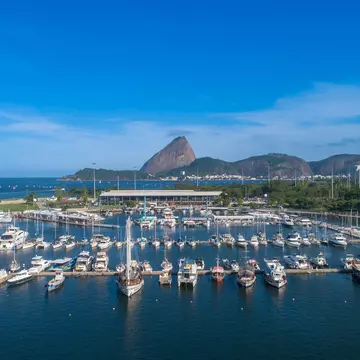 An Uber Boat river bus services crosses through the Thames in central London