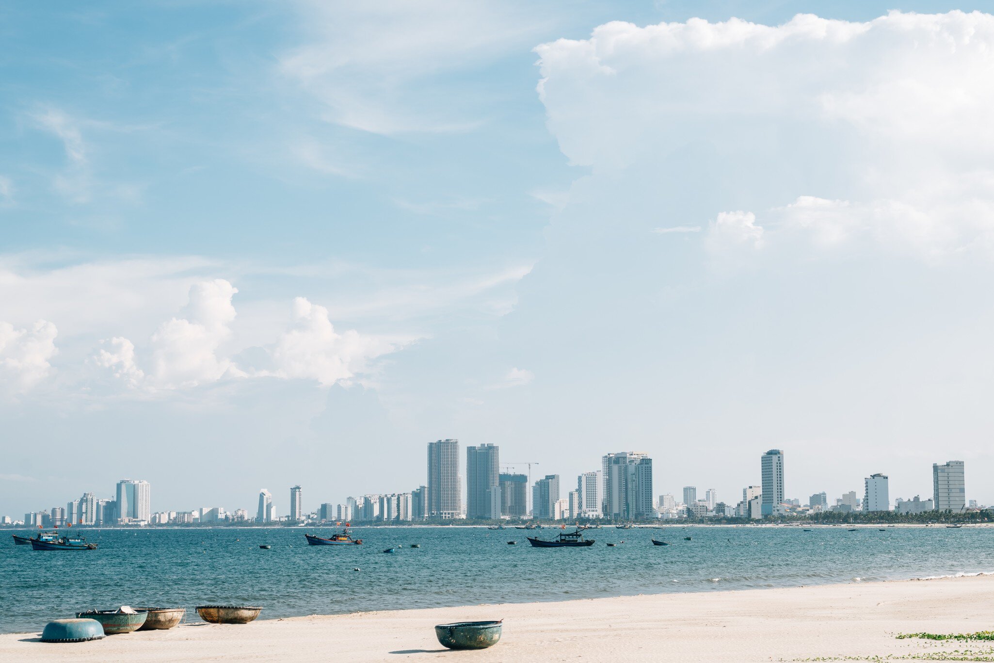 Da Nang Man Thai beach with fishing boats in Vietnam.