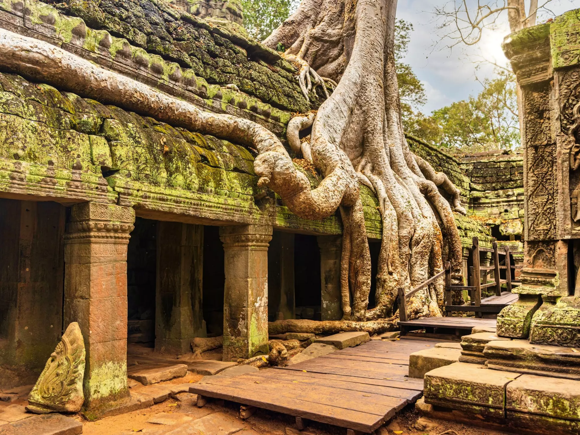 Wander through the timeworn gateways of Angkor Wat, one of the highlights of Asia. Framalicious/Shutterstock