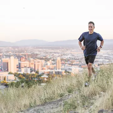 Running on a hilltop over Salt Lake City, Utah, United States